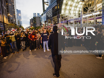 Pro-Palestine protesters hold a ''Make it Great Like '68'' protest in front of the Israeli consulate in Chicago, United States, on August 20...