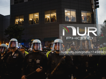 Pro-Palestine protesters hold a ''Make it Great Like '68'' protest in front of the Israeli consulate in Chicago, United States, on August 20...