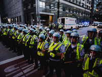 Pro-Palestine protesters hold a ''Make it Great Like '68'' protest in front of the Israeli consulate in Chicago, United States, on August 20...