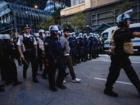 Pro-Palestine protesters hold a ''Make it Great Like '68'' protest in front of the Israeli consulate in Chicago, United States, on August 20...