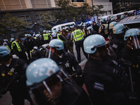 Pro-Palestine protesters hold a ''Make it Great Like '68'' protest in front of the Israeli consulate in Chicago, United States, on August 20...