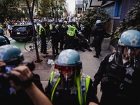 Pro-Palestine protesters hold a ''Make it Great Like '68'' protest in front of the Israeli consulate in Chicago, United States, on August 20...