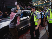 Pro-Palestine protesters hold a ''Make it Great Like '68'' protest in front of the Israeli consulate in Chicago, United States, on August 20...