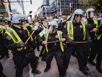 Pro-Palestine protesters hold a ''Make it Great Like '68'' protest in front of the Israeli consulate in Chicago, United States, on August 20...