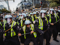 Pro-Palestine protesters hold a ''Make it Great Like '68'' protest in front of the Israeli consulate in Chicago, United States, on August 20...