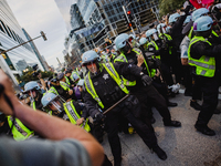 Pro-Palestine protesters hold a ''Make it Great Like '68'' protest in front of the Israeli consulate in Chicago, United States, on August 20...