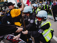 Pro-Palestine protesters hold a ''Make it Great Like '68'' protest in front of the Israeli consulate in Chicago, United States, on August 20...