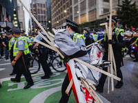 Pro-Palestine protesters hold a ''Make it Great Like '68'' protest in front of the Israeli consulate in Chicago, United States, on August 20...