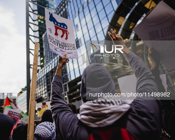 Pro-Palestine protesters hold a ''Make it Great Like '68'' protest in front of the Israeli consulate in Chicago, United States, on August 20...