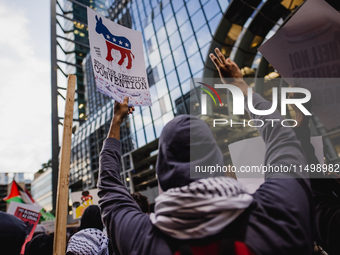 Pro-Palestine protesters hold a ''Make it Great Like '68'' protest in front of the Israeli consulate in Chicago, United States, on August 20...