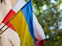 A Ukrainian flag with a Polish flag is seen on the street in Krakow, Poland, on August 13, 2024. (