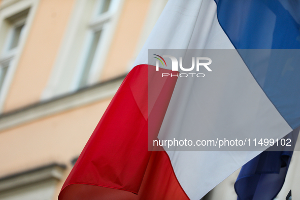 A French flag is seen on the street in Krakow, Poland, on August 13, 2024. 