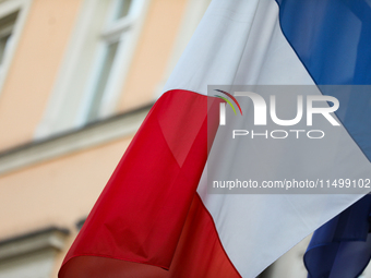 A French flag is seen on the street in Krakow, Poland, on August 13, 2024. (