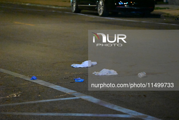 Two people are shot, one critically wounded, in a shooting on the 7800 block of S. Colfax Avenue in Chicago, Illinois, United States, on Aug...