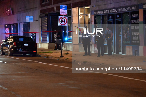 Two people are shot, one critically wounded, in a shooting on the 7800 block of S. Colfax Avenue in Chicago, Illinois, United States, on Aug...