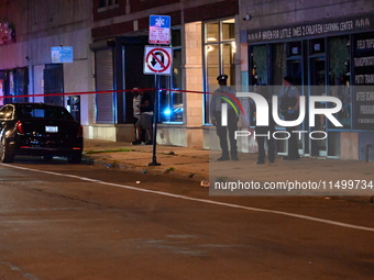 Two people are shot, one critically wounded, in a shooting on the 7800 block of S. Colfax Avenue in Chicago, Illinois, United States, on Aug...