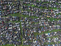 An aerial photo taken on August 22, 2024, shows a large number of cars and motorcycles waiting to be dismantled at a scrap point for discard...