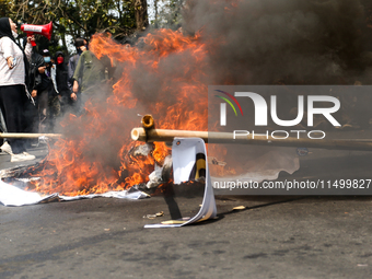 A student gives a speech during a demonstration to reject the ratification of the Regional Head Election (Pilkada) Bill in front of the West...