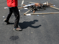 A student gives a speech during a demonstration to reject the ratification of the Regional Head Election (Pilkada) Bill in front of the West...