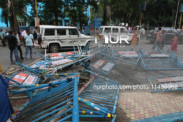 Bharatiya Janata Party (BJP) participates in a protest rally marching to the Health Headquarters and crosses the police barricade in protest...