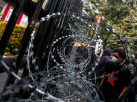 Thousands of people protest to reject the revision of the Regional Head Election Bill (RUU) in front of the West Java DPRD Building in Bandu...