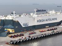 HOEGH AURORA, the world's largest and most environmentally friendly vehicle carrier, docks at Taicang Port Area to load vehicles on its maid...