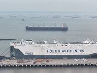 HOEGH AURORA, the world's largest and most environmentally friendly vehicle carrier, docks at Taicang Port Area to load vehicles on its maid...