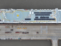 HOEGH AURORA, the world's largest and most environmentally friendly vehicle carrier, docks at Taicang Port Area to load vehicles on its maid...