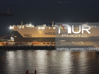 HOEGH AURORA, the world's largest and most environmentally friendly vehicle carrier, docks at Taicang Port Area to load vehicles on its maid...