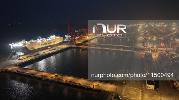 HOEGH AURORA, the world's largest and most environmentally friendly vehicle carrier, docks at Taicang Port Area to load vehicles on its maid...