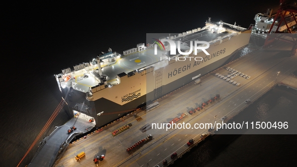 HOEGH AURORA, the world's largest and most environmentally friendly vehicle carrier, docks at Taicang Port Area to load vehicles on its maid...