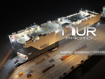 HOEGH AURORA, the world's largest and most environmentally friendly vehicle carrier, docks at Taicang Port Area to load vehicles on its maid...