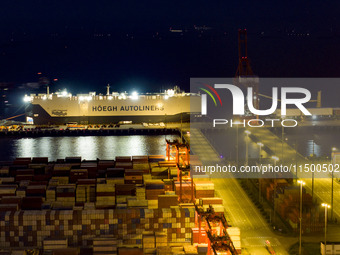 HOEGH AURORA, the world's largest and most environmentally friendly vehicle carrier, docks at Taicang Port Area to load vehicles on its maid...