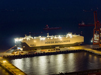 HOEGH AURORA, the world's largest and most environmentally friendly vehicle carrier, docks at Taicang Port Area to load vehicles on its maid...