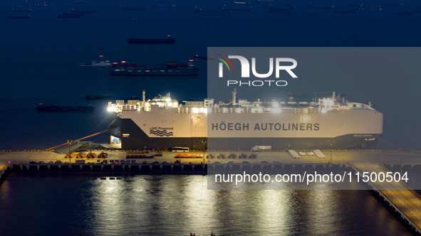 HOEGH AURORA, the world's largest and most environmentally friendly vehicle carrier, docks at Taicang Port Area to load vehicles on its maid...