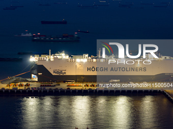 HOEGH AURORA, the world's largest and most environmentally friendly vehicle carrier, docks at Taicang Port Area to load vehicles on its maid...