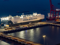 HOEGH AURORA, the world's largest and most environmentally friendly vehicle carrier, docks at Taicang Port Area to load vehicles on its maid...