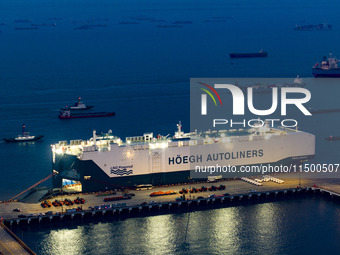 HOEGH AURORA, the world's largest and most environmentally friendly vehicle carrier, docks at Taicang Port Area to load vehicles on its maid...