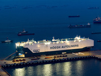 HOEGH AURORA, the world's largest and most environmentally friendly vehicle carrier, docks at Taicang Port Area to load vehicles on its maid...