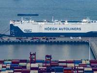 HOEGH AURORA, the world's largest and most environmentally friendly vehicle carrier, docks at Taicang Port Area to load vehicles on its maid...