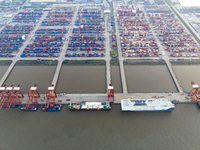 HOEGH AURORA, the world's largest and most environmentally friendly vehicle carrier, docks at Taicang Port Area to load vehicles on its maid...