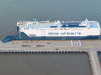 HOEGH AURORA, the world's largest and most environmentally friendly vehicle carrier, docks at Taicang Port Area to load vehicles on its maid...