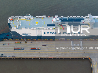 HOEGH AURORA, the world's largest and most environmentally friendly vehicle carrier, docks at Taicang Port Area to load vehicles on its maid...