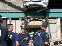 A car drives through the barrier at the Whole Foods in Tenleytown, Washington, DC, damaging the entrance to a Wawa convenience store. No one...