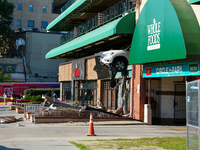 A car drives through the barrier at the Whole Foods in Tenleytown, Washington, DC, damaging the entrance to a Wawa convenience store. No one...