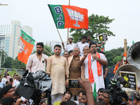 Bharatiya Janata Party's (BJP) state president Sukanta Majumdar speaks with BJP senior leaders Dilip Ghosh and others near 'Swasthya Bhawan'...