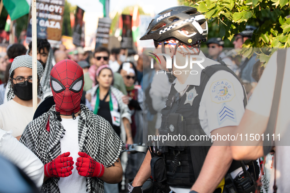 Pro-Palestinian activists marched through the streets of Chicago on August 21, 2024, to protest the Democratic National Committee's conventi...