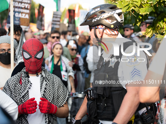 Pro-Palestinian activists marched through the streets of Chicago on August 21, 2024, to protest the Democratic National Committee's conventi...