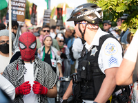 Pro-Palestinian activists marched through the streets of Chicago on August 21, 2024, to protest the Democratic National Committee's conventi...