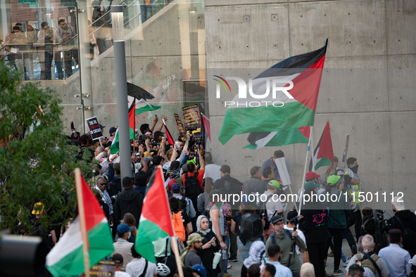 Pro-Palestinian activists marched through the streets of Chicago on August 21, 2024, to protest the Democratic National Committee's conventi...